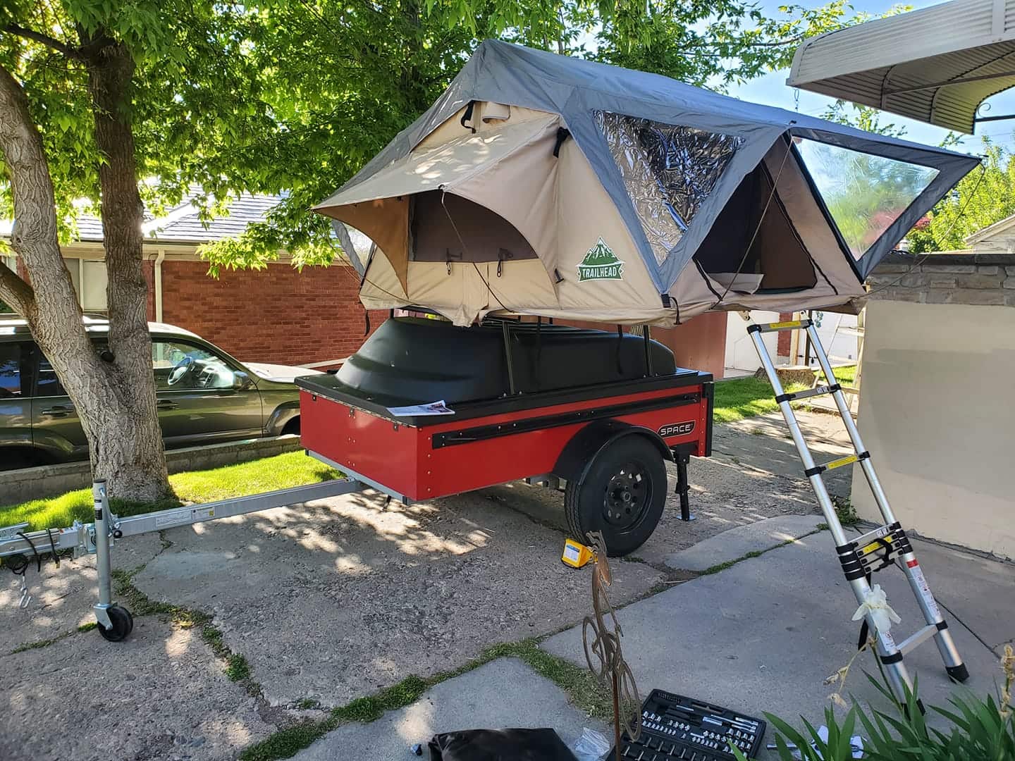 red space trailer with tent